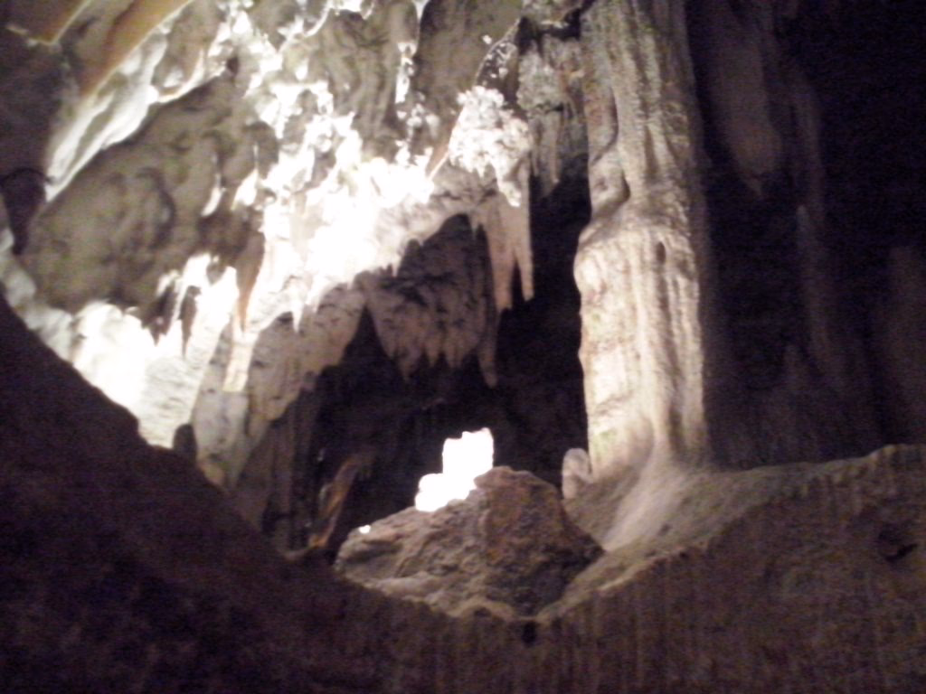 How far is Postojna castle from the famous caves?