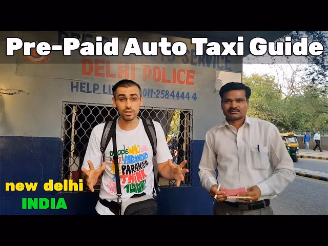 How many taxis are booked a day at New Delhi railway station?