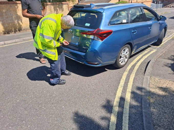 How do I complain about a taxi parked in Derby?