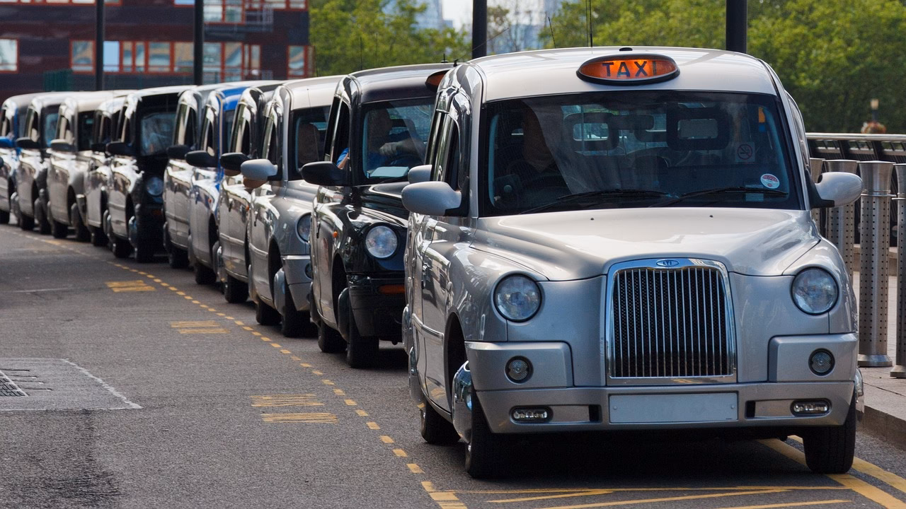 When will taxi licensing standards go before cabinet in Salford?