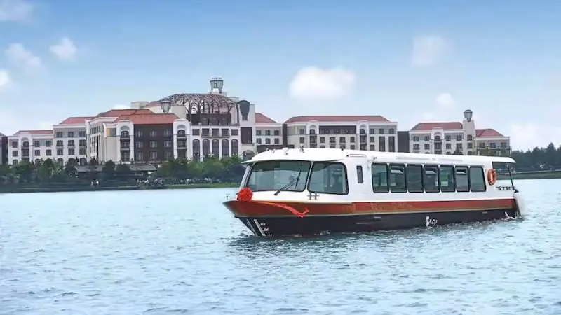 How much does a private transfer from Shanghai Airport to Disneyland cost?