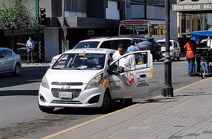 Who provides Tameside taxi service?