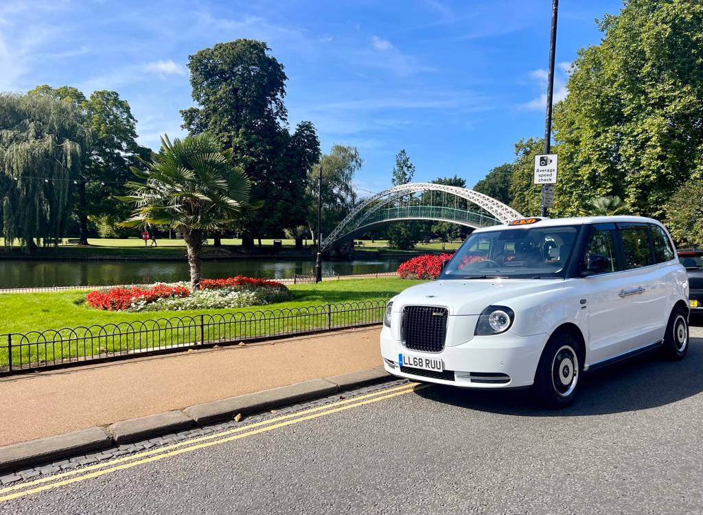 How do I book an airport taxi to and from Bedford?