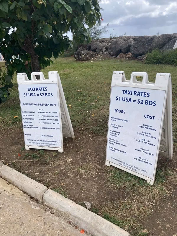 How do private taxi transfers work in Barbados?