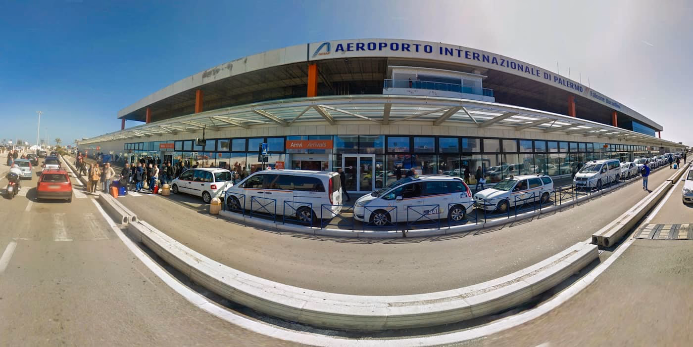 How do I stop a taxi from Palermo Airport (PMO)?