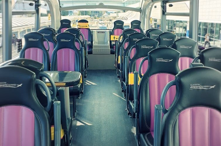 Who provides Glasgow Queen Street station taxi service?