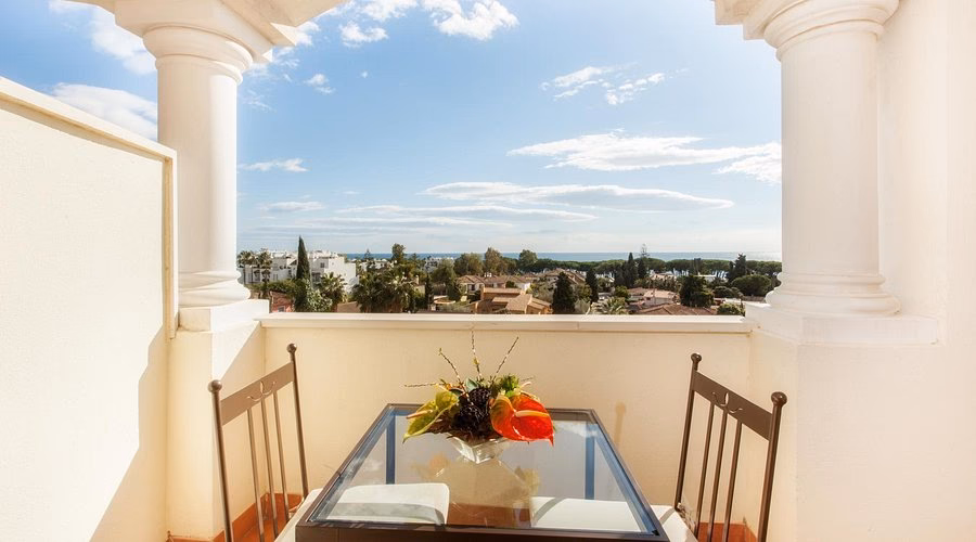 What makes guadalpin suites aparthotel unique?