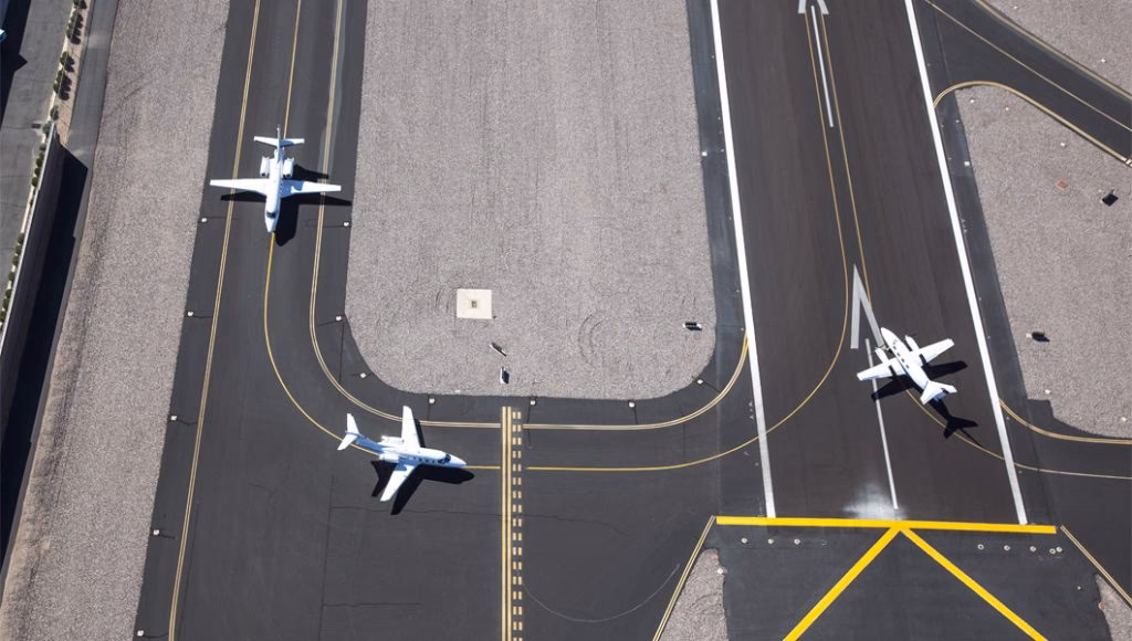 Which airport has the longest “taxi out” time?