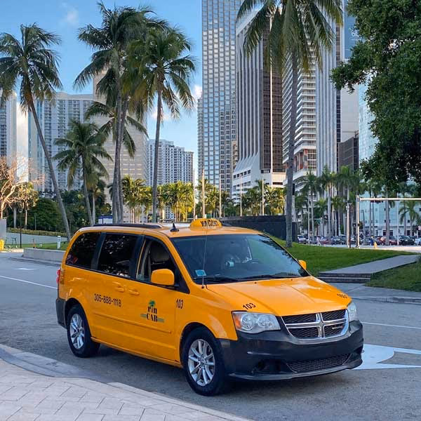 How does a Miami International Airport taxi service work?