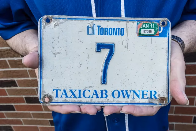 Who is exempt from Toronto taxicab fees?