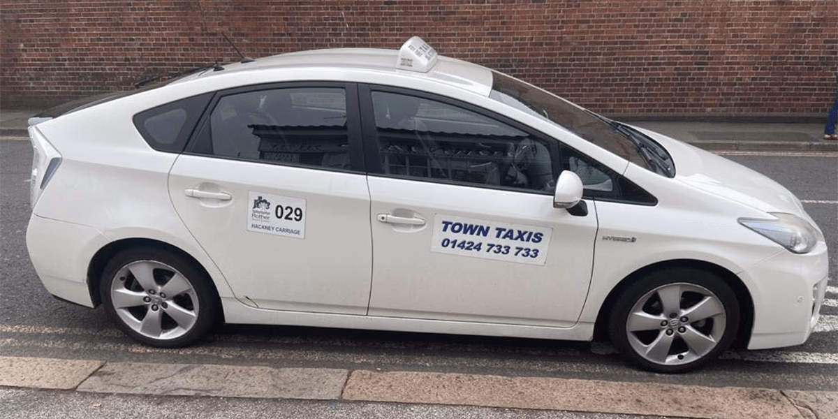 Who is ez taxis Bexhill airport transfers?