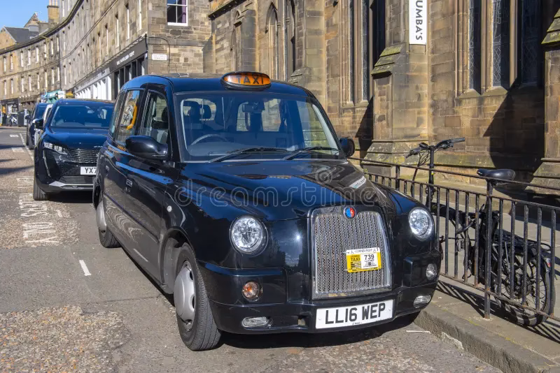 How do I book a private car or taxi in Scotland?