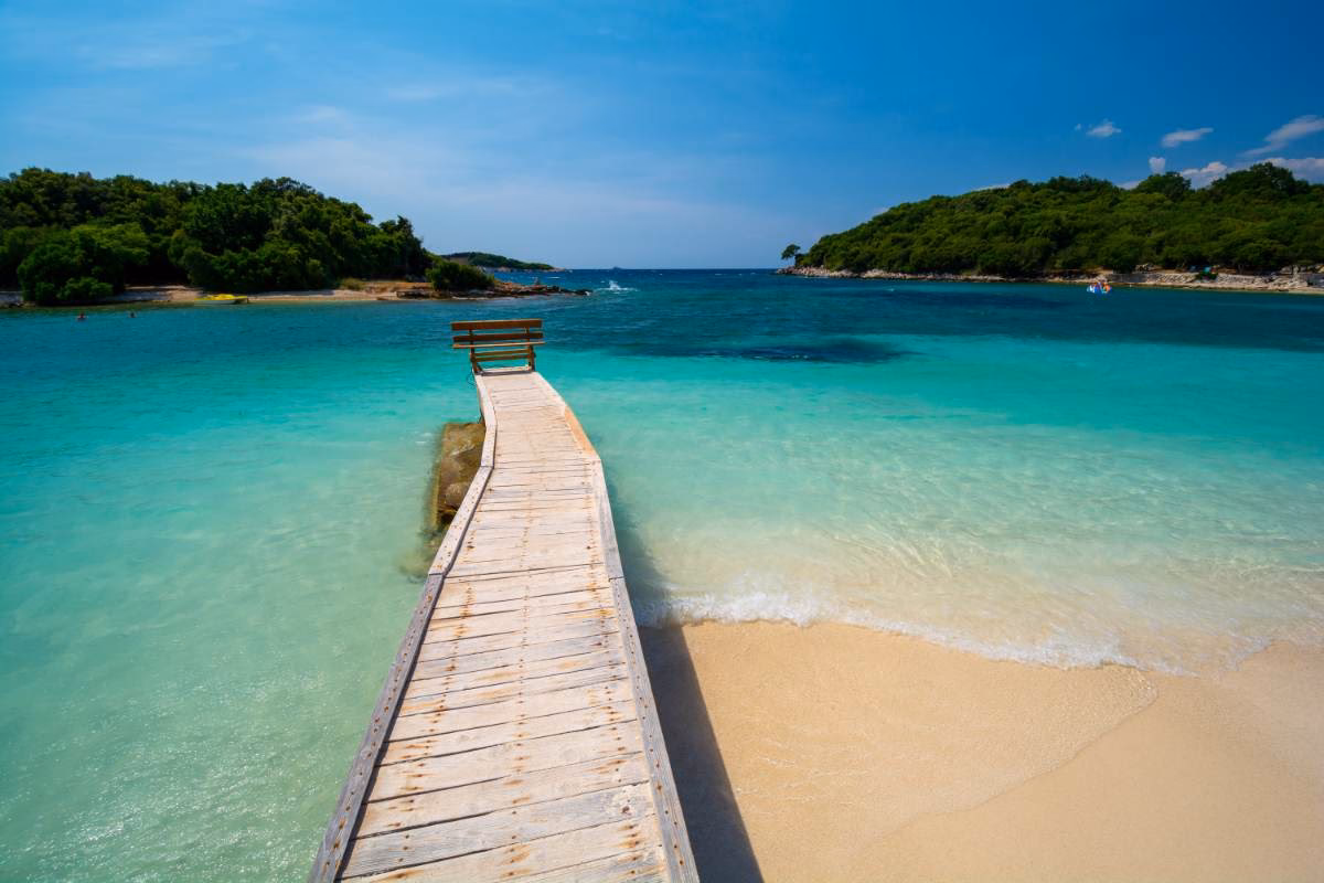 How far is Tirana airport from Ksamil?