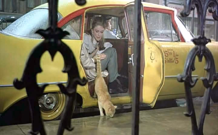 Why did Holly Golightly throw her cat out of a cab?